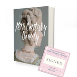 A book with a sage green background and the image of a lady with a white curly wig appearing to be from the 18th century. The title of the book says The American Duchess Guide to 18th Century Beauty. There is a square pink bookplate next to the book that indicates it is signed by the author Abby Cox.