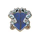 Pin is about 1.25" tall and depicts a powder blue corset surrounded by gold, white, and pink daises with green leaves and a light blue background.