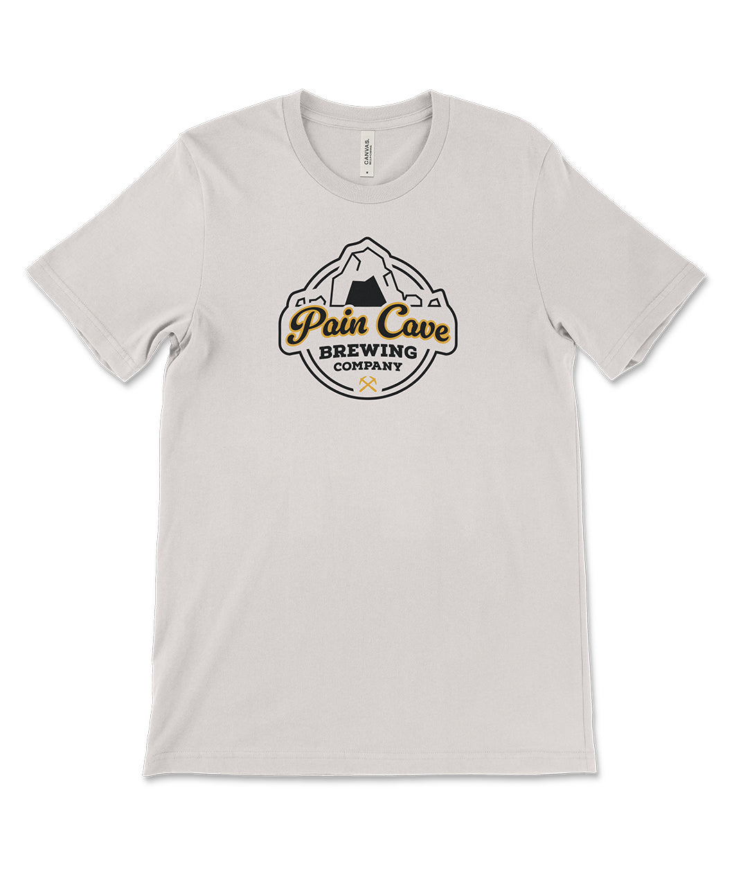 An off-white t-shirt with a design of a fake brewing company logo on the front. The logo is of a cave with the text, "Pain Cave Brewing Company" beneath it. From Courtney Dauwalter.