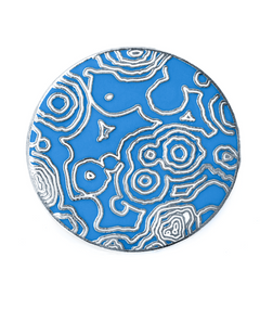 Silver circular pin with light blue enamel with white enamel and silver metal topographic lines.