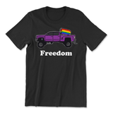 A black t-shirt with a lifted purple truck with pride flags flying from the back and the text "Freedom" below it. From Semi Rad.