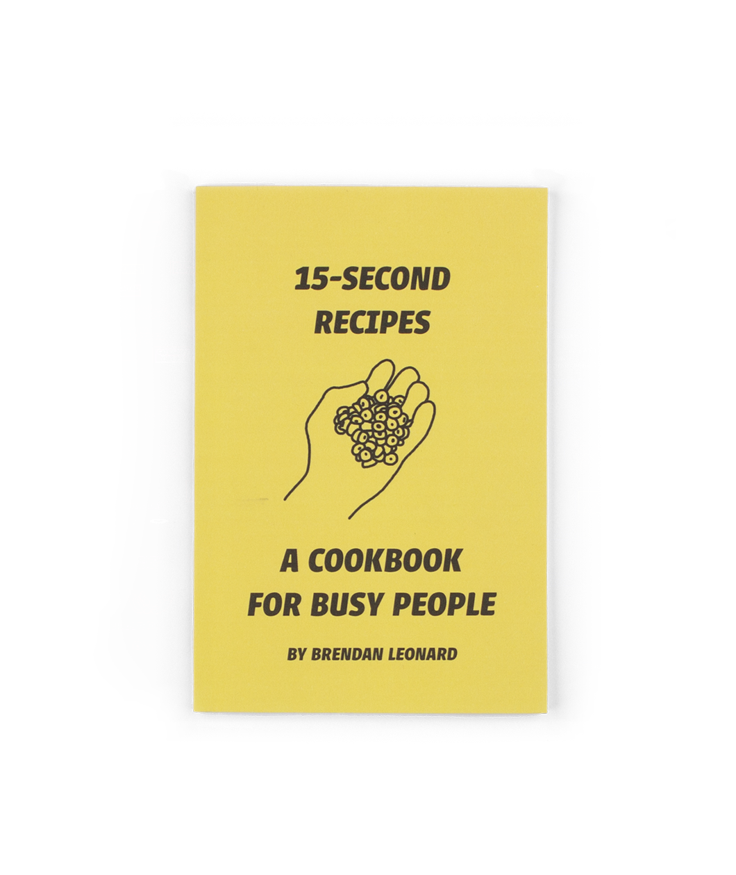 The cover of a book with a yellow background and a title that reads "15-second recipes; A cookbook for busy people; By Brendan Leonard" with an illustration of a hand holding berries in the middle. From Semi Rad.