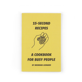 The cover of a book with a yellow background and a title that reads "15-second recipes; A cookbook for busy people; By Brendan Leonard" with an illustration of a hand holding berries in the middle. From Semi Rad.