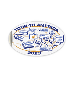 An oval shaped white decal showing different cities around the world with the text "Tour-th America 2023".