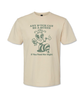 Natural colored t shirt with screen printed sage green text & artwork that says, "Any Bitch can be a queen" with an illustration of a queen bee smoking a long cigarette and drinking a glass of wine. Underneath it says, "If you feed her right"