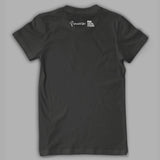 Back of black shirt. Below the collar, "Physics Girl” is in white sans serif font. To the left, a stylized “P” is in white. Above is half an arrow. To the right is the “PBS Digital Studios” logo - from Physics Girl