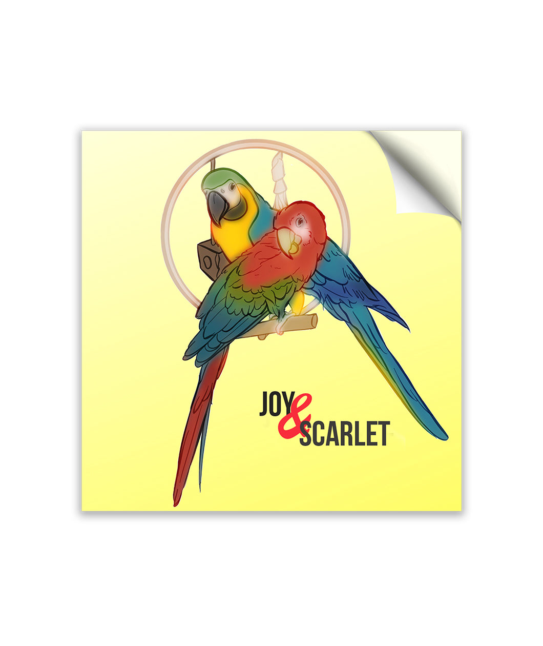Two mackaws sitting on a tan dowell. Mackaw in front is red, green, and blue. Behind is another mackaw colored yellow, green, and blue. Both are in front of small tan circle. Inside of circle are objects hanging. “Joy & Scarlet” is written below mackaws in black sans serif font. The “&” is italicized and red. The base color of sticker is yellow - from Animal Wonders