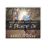 A sqaure photo of two people running through a forest. “Brian & Ethan Chat About” is in white sans serif font. “A decade on” is in white handwritten font. Both are on a gray bar with light opacity. “Director’s Commentary Bonus Feature” is at the bottom in white sans serif font - from the Ginger Runner