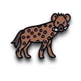 A hyena pin that is brown, with dark brown dots, holding a bone in its mouth.