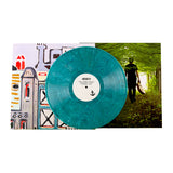 A teal vinyl in the middle reading "Anchor EP". On the right side of the vinyl is an image of a man walking in a forest holding a guitar in one hand. On the other side is an image of drawn, colorful buildings. From Rob Scallon.
