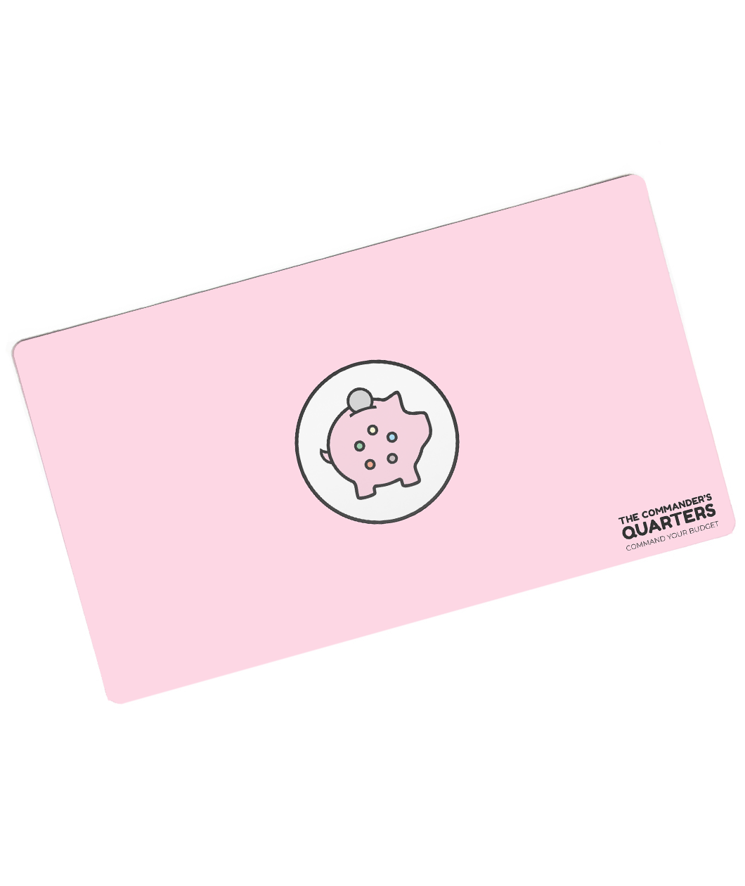 A pink rectangular playmat with curved corners. In the center is a white circle with a black outline. A piggy bank is in the center with a coin being inserted. On the pig are five circles of different colors. “The Commander’s Quarters” is in the bottom right in black sans serif font - from The Commaner’s Quarters