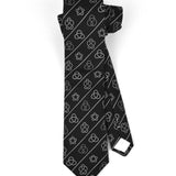 Black tie with alternating white lines and different designs of mathematical knot diagrams by 3Blue1Brown.