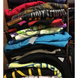 Stack of various styles of mystery shirts - from DFTBA Records