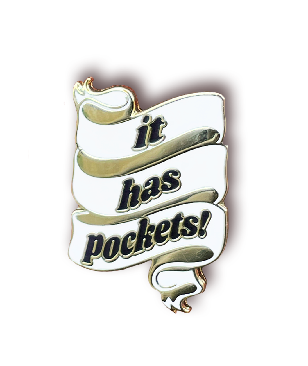 A white ribbon with three folds. Across each fold is one word from the black serif text that says, “it has pockets!” - from Sierra Schultzzie