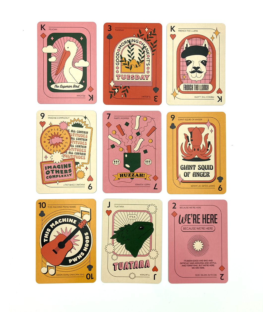A grid of nine face up Nerdfighter playing cards. They are a warm pastel color scheme with different illustrations on each card.