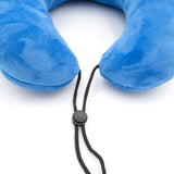 A closeup of a blue neck pillow in the shape of a pi character. The pillow is blue, and the part of the pillow that wraps around the neck connects with a drawstring at the end of the arms. From 3Blue1Brown.