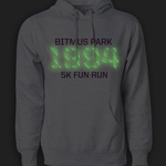 Heather white hoodie with large glowing 1994 in the front center and "Bitmus Park 5K Fun Run" sandwiched around it in smaller font. By Brian David Gilbert.