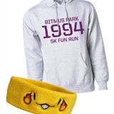 Heather white hoodie with large red 1994 in the front center and "Bitmus Park 5K Fun Run" sandwiched around it in smaller font. The hoodie has a front pocket on the bottom. Bundled with the hoodie is a yellow sweatband with a smiling face that has a fireball on the side of each eye. By Brian David Gilbert.