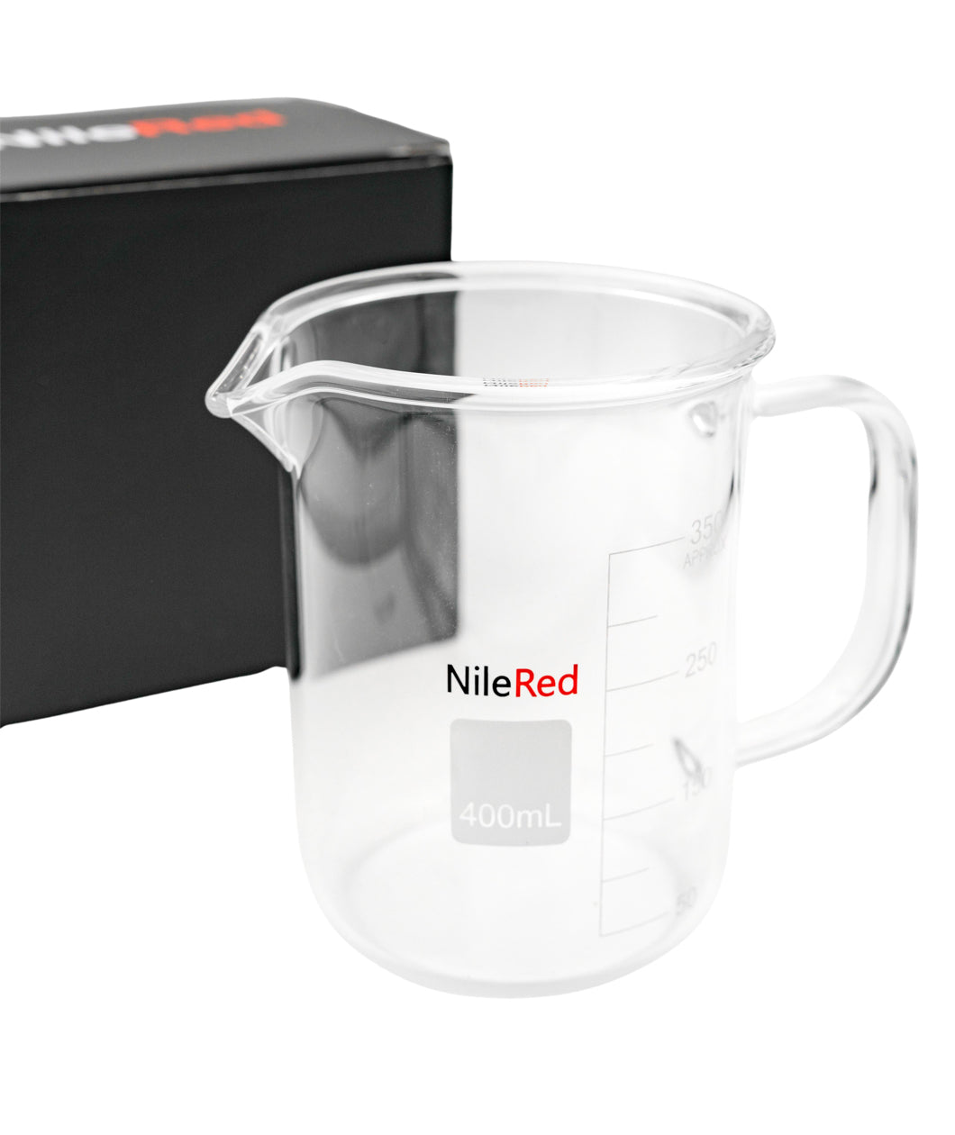 Clear beaker shaped mug with NileRed logo in front of a black box.