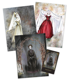 Mockup of a set of three prints and one tarot card featuring gothic-themed illustrations of women in elaborate dresses on a white background.