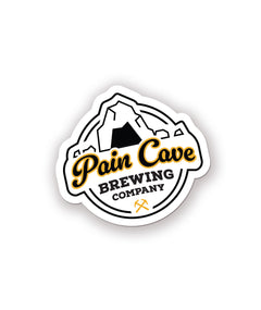 A sticker of a fake brewing company logo. The logo is of a cave with the text, "Pain Cave Brewing Company" beneath it. From Courtney Dauwalter.