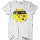 A mockup of an off-white t-shirt with a design featuring a hand drawn yellow and black Dear Hank & John logo.