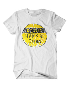 A mockup of an off-white t-shirt with a design featuring a hand drawn yellow and black Dear Hank & John logo.