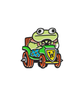 Black plated enamel pin of a frog driving a green go cart with red wheels. 