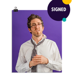 Photo of a man with his glasses askew on his face and ruffled tie and white dress shirt. He looks confused. On a purple background. This print is signed by the doctor!