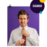 Photo of a man with aviator shaped glasses fixing his red tie and looking at the camera like he is a know it all. On a purple background. This print is signed by the doctor!