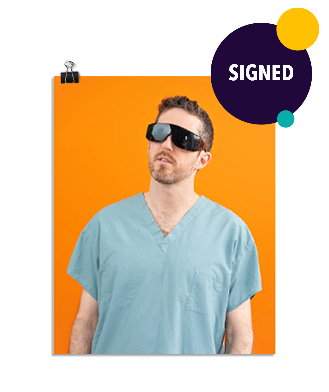 Photo of a man wearing large black glasses and seafoam colored scrubs looking up to the left. On an orange background. This print is signed by the doctor!