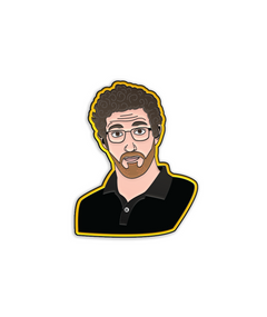 Enamel pin with black metal plating that has the bust of a man with glasses looking at you with a yellow background.