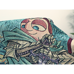 Detailed image of the blanket of the illustration of Crendor smiling smuggly and looking downward as he holds a silver sword with fully gloved hands dressed in a green armor and green cloak.