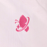 Close up image of the embroidered space butterfly logo. It is a butterfly side profile silhouette with a diamond shaped star to the left of its antenna and a swooping half circle cutting through it similar to the nike logo.