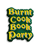 Forest green rubber magnet with yellow, orange, and teal layered text that says "Burnt Cook Book Party" in a medieval book font.