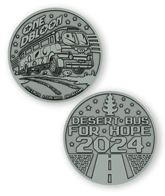A digital mockup of a dark silver coin. The front shows an image of a bus with the text "One DBloon; Agimus Liberos Adjutum" The back shows an image of a road and tree-shaped air freshener with the text "Desert Bus for Hope 2024"