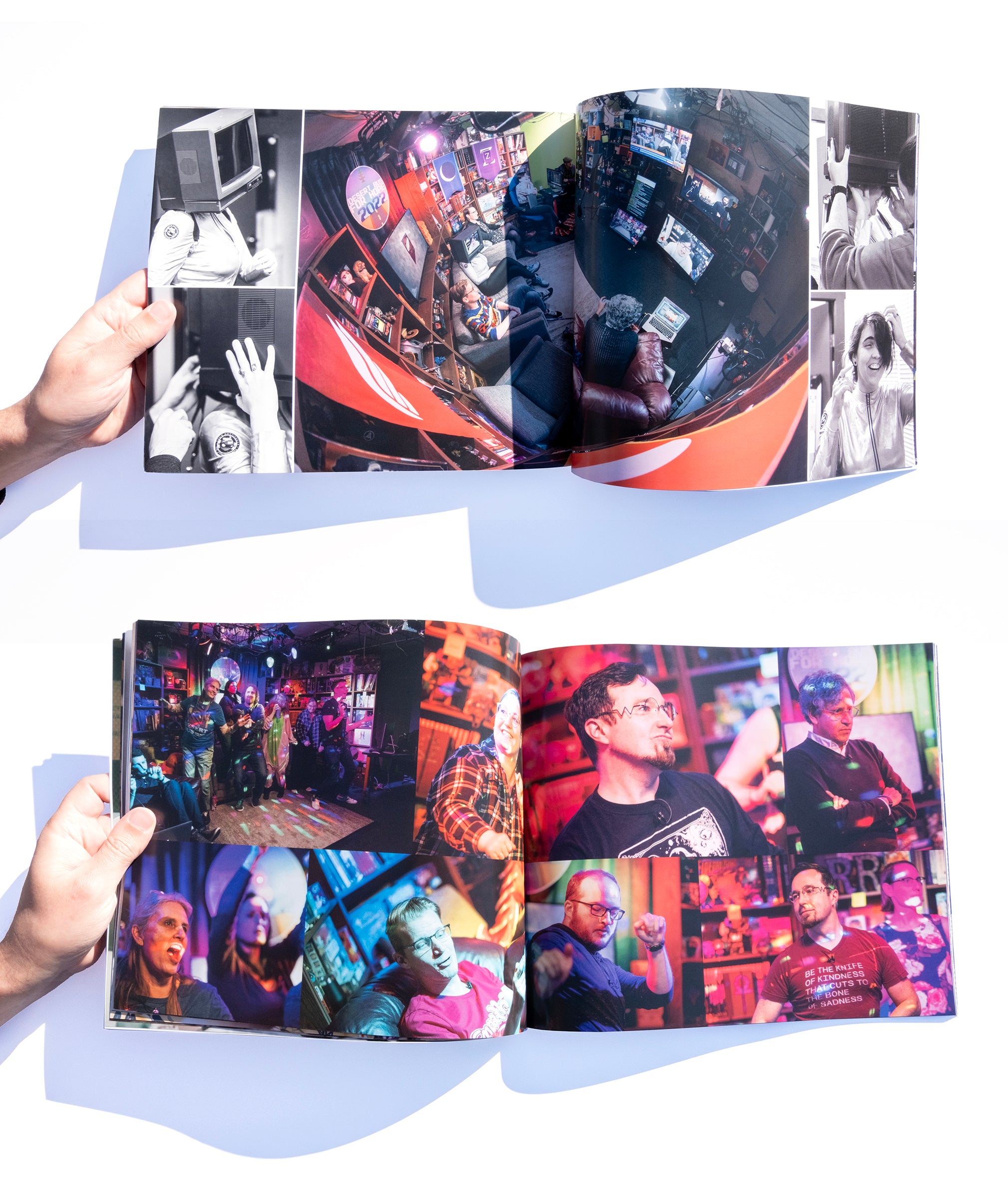 A photo of several inner pages from the Desert Bus for Hope 2022 photo book.