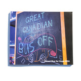 A photo of the front of the Desert Bus for Hope 2024 photo book. It features a chalkboard illustration that reads "Great Canadian Bus Off"