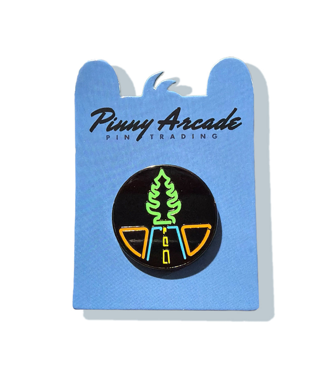 A photo of a pin on a blue Pinny Arcade Pin Trading backer card. It has a black glitter background and neon outlines of a road and tree-shaped air freshener.