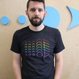 Man wearing a black t-shirt with a rainbow loadingreadyrun logo printed on the chest