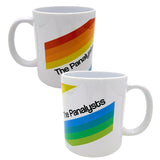 A photo mashup showing two sides of the same mug. The design reads "The Panalysts" with one side featuring red and orange stripes and the other featuring blue and green stripes.