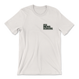 A t-shirt in natural white with a design printed on the front left chest. The design is the logo for Local News International. From Local News International.