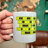 News by Humans For Humans Mug