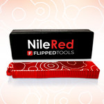 Packaging mockup for a red bottle opener. The packaging reads "Nile Red; Flipped Tools"