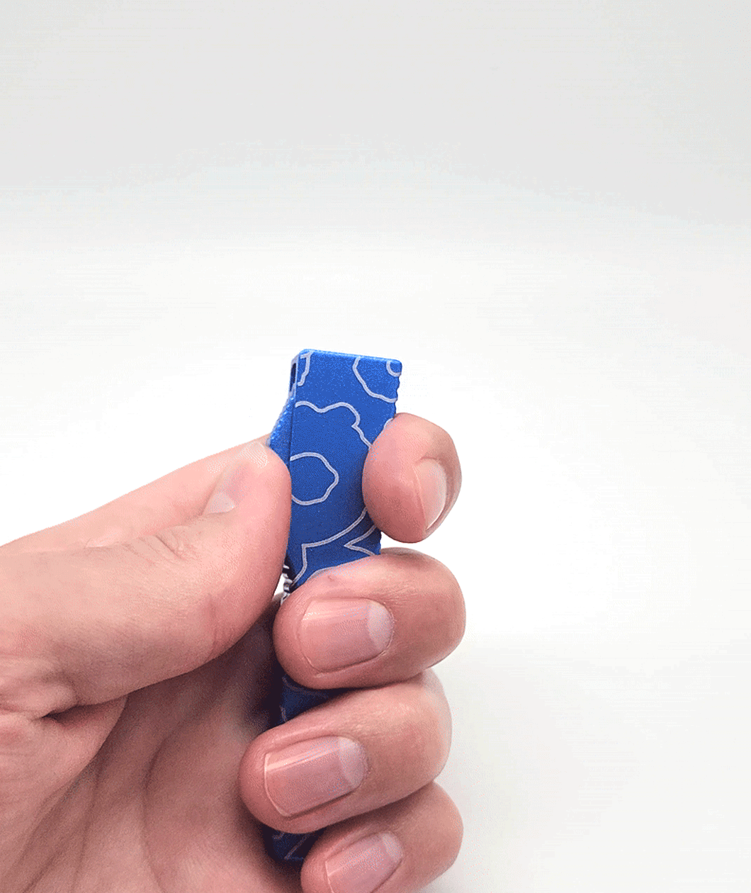 An animated photo gif of a hand opening and closing a blue bottle opener