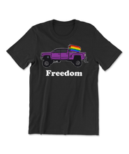 A black t-shirt with a lifted purple truck with pride flags flying from the back and the text "Freedom" below it. From Semi Rad. 