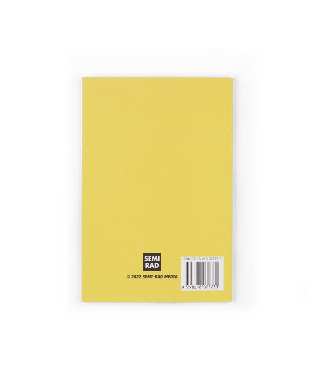 The back of a yellow book with the Semi Rad logo at the bottom and a barcode. 