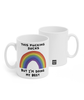 Two white mugs sitting next to each other showing two sides of the same mug. The front side has text that reads "This fucking sucks; but I'm doing my best". In between the two lines of text is a rainbow. On the back of the mug is a small black square with the words "Semi Rad".