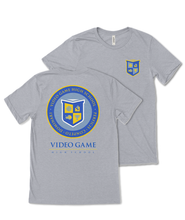 Back of a grey shirt with the video game high school emblem in yellow and blue. Front of the grey version of this shirt with the shield crest of video game high school in the upper right of the chest also in blue and yellow colors.