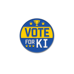 Blue metal circular pin with the words "VOtE FOR KI" with yellow stars.